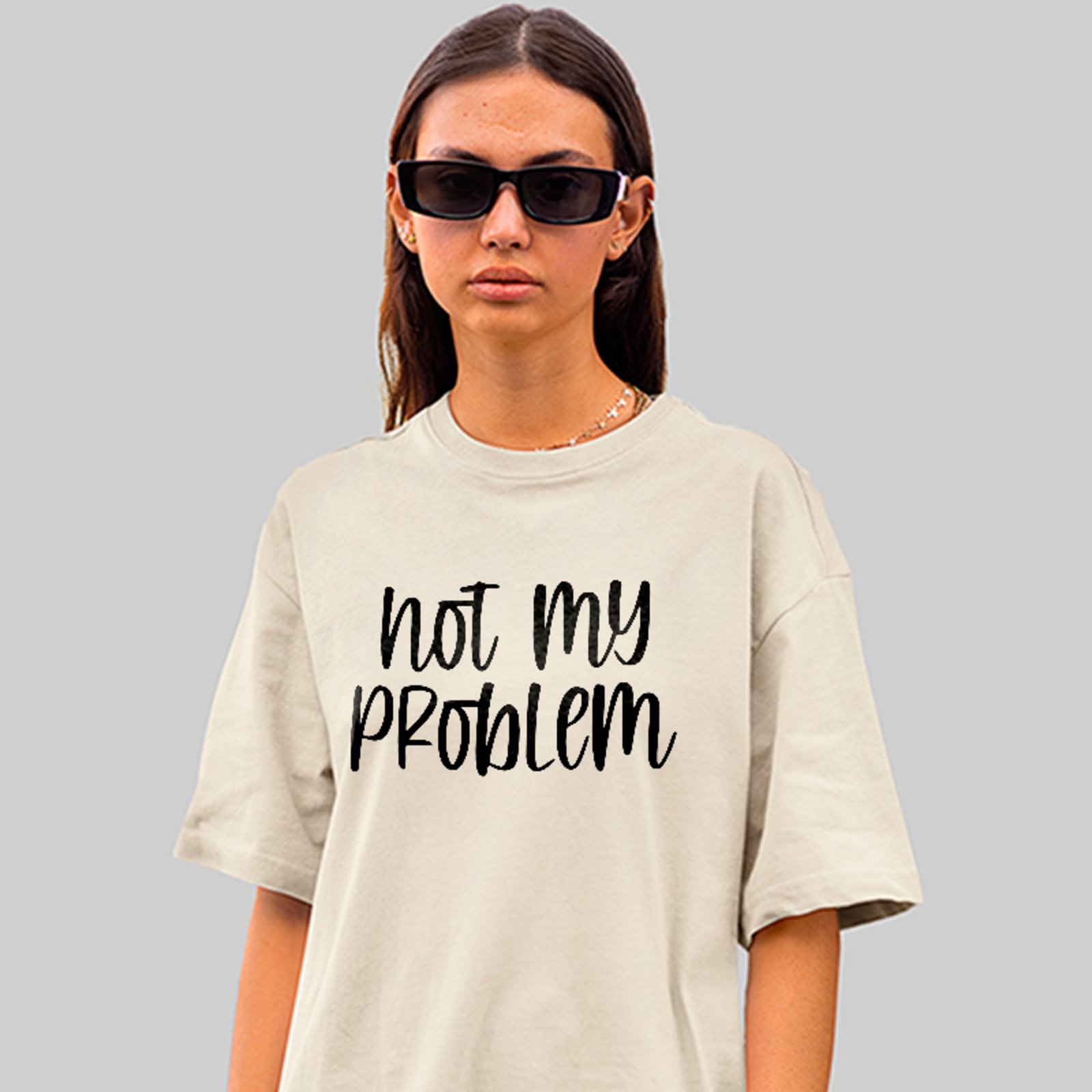 Camiseta Oversized Not My Problem Humor Irônico Vibes Unissex Off White