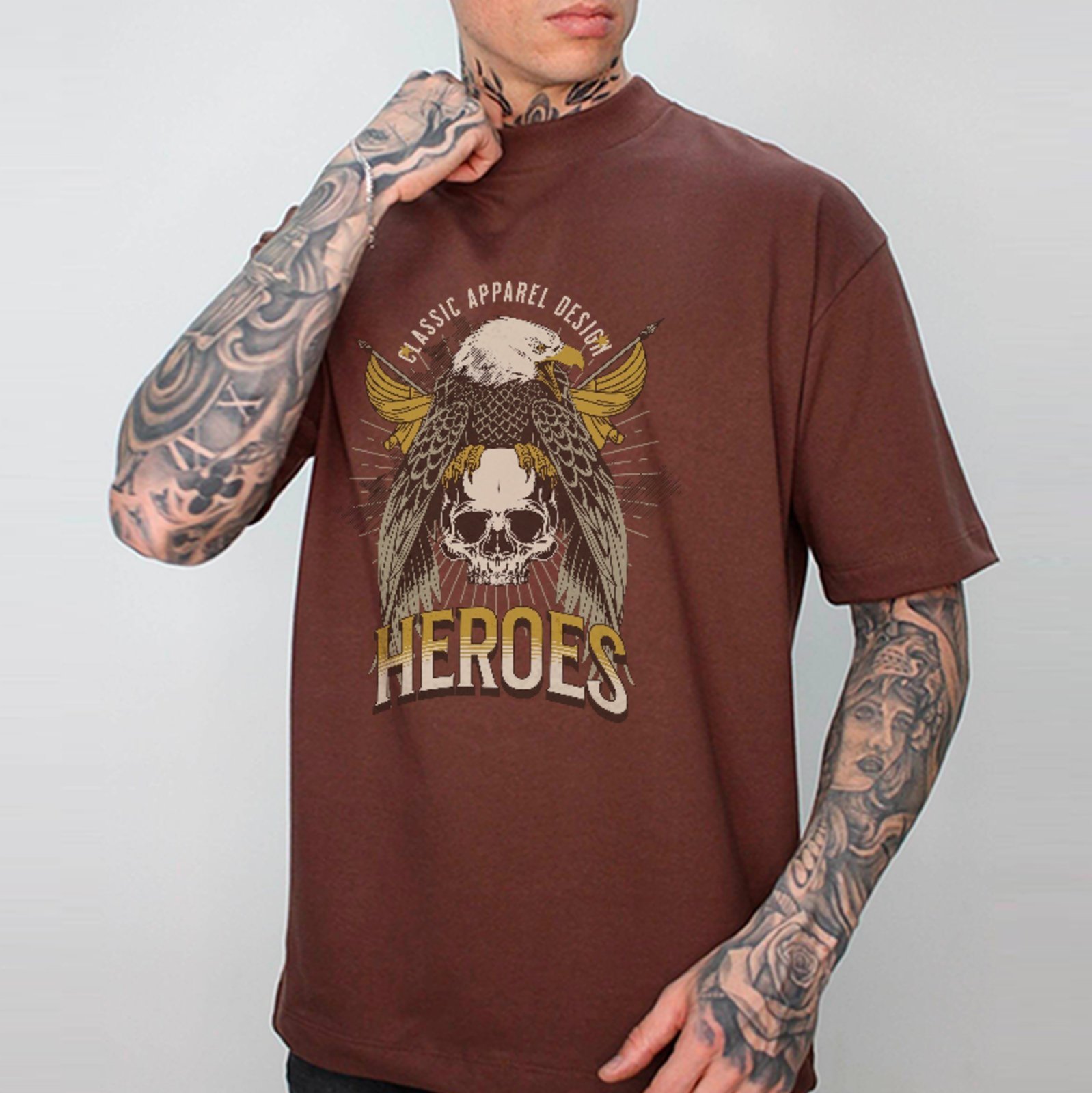 Camiseta Oversized Premium Heroes Águia Caveira Streetwear Unissex Marrom
