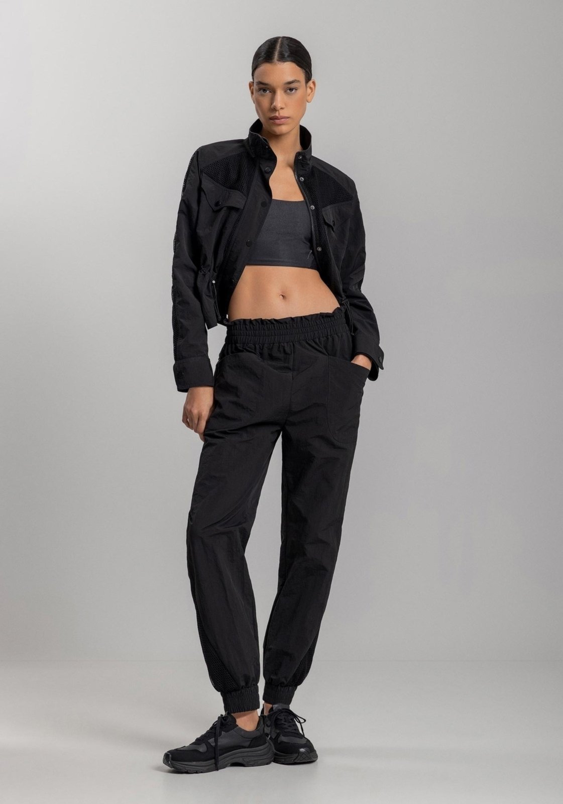 Calça Jogging Com Cintura Média E Recortes Em Tela Move