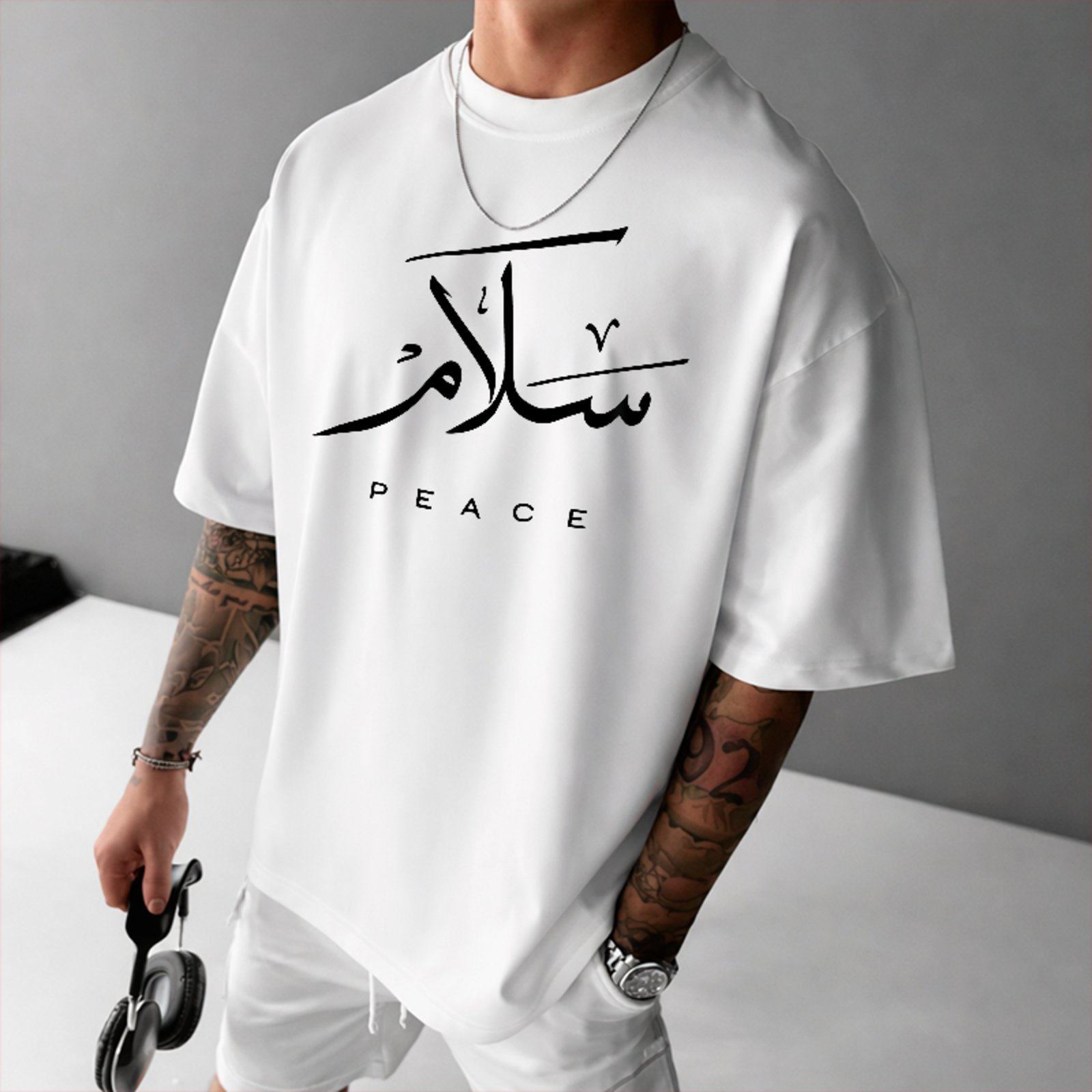 Camiseta Oversized Salam Peace Caligrafia Árabe Unissex Branco