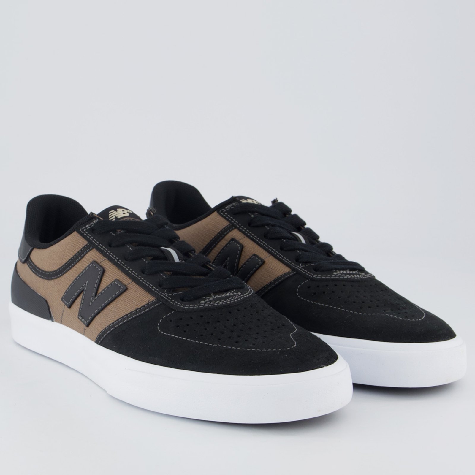 Vista 3 Tênis New Balance NM272 e Marrom preto New Balance preto