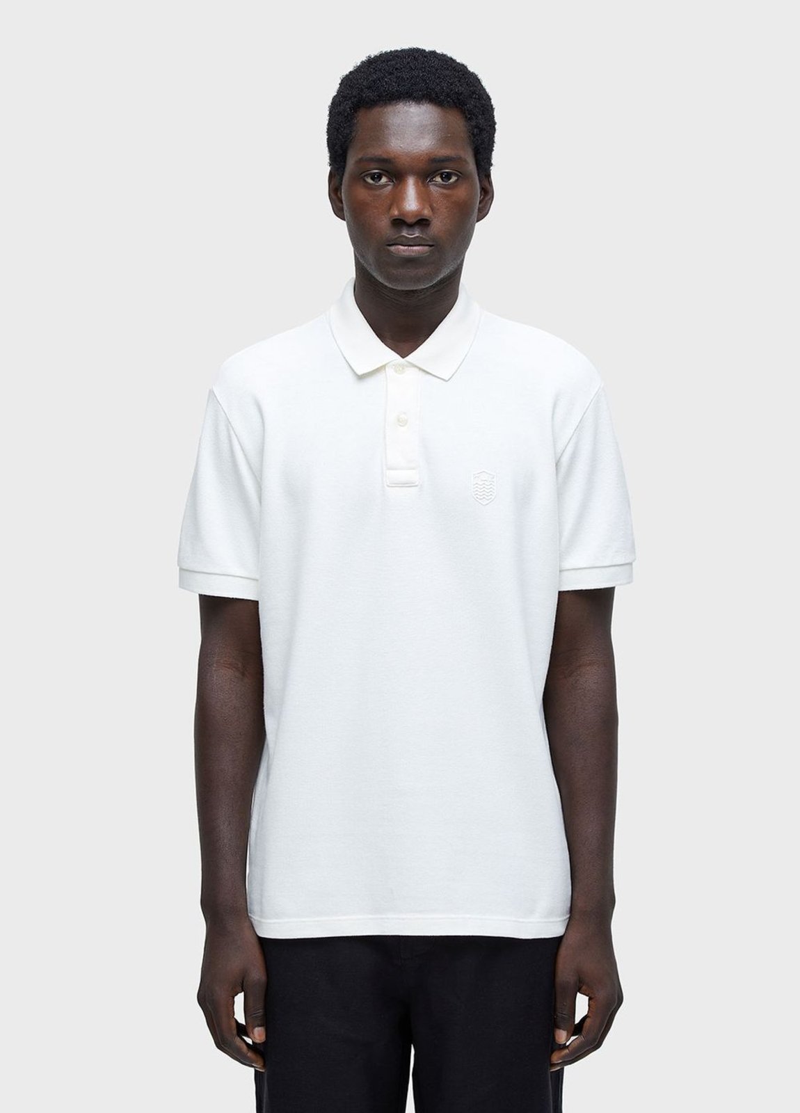 Polo brasão embossed color OSKLEN
