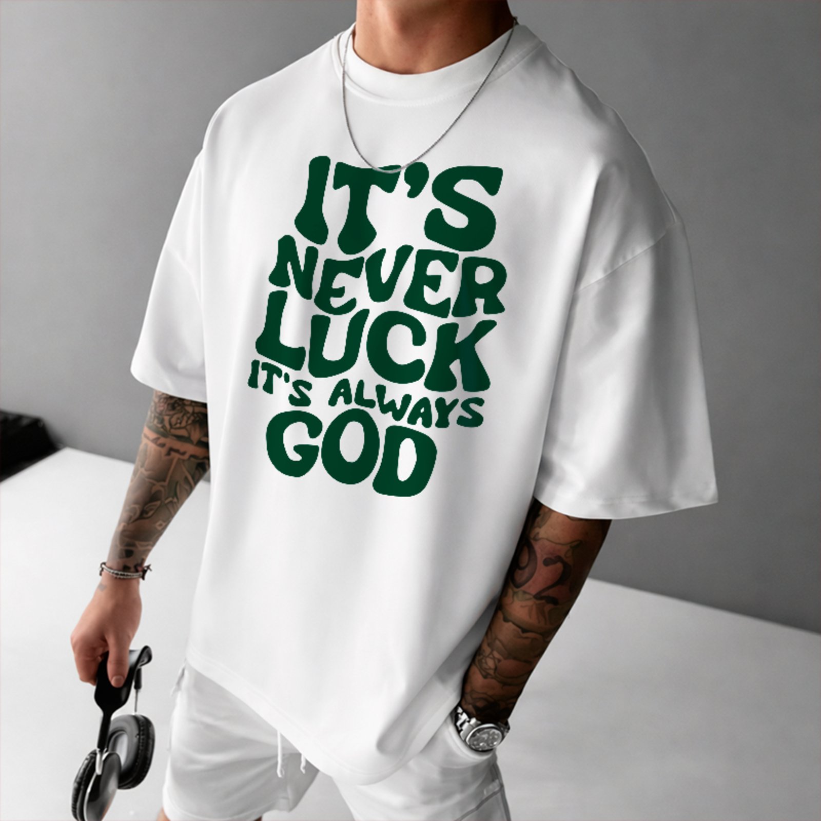 Camiseta Oversized It’s Never Luck It’s God Unissex Branco