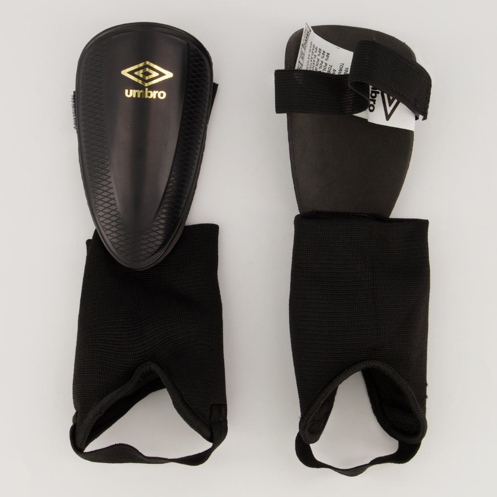 Vista 2 Caneleira Umbro Protection CT Juvenil Preta preto Umbro preto