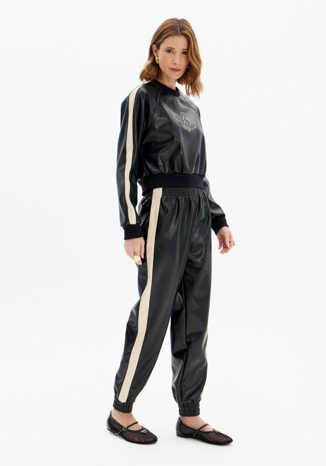 Vista 2 Calça Jogging Bicolor Pu Com Elástico Lança Perfume preto Lança Perfume preto