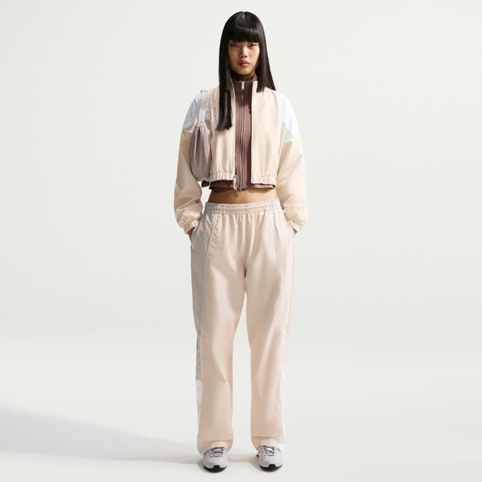 Vista 2 Calça Nike Sportswear Track Feminina bege Nike bege