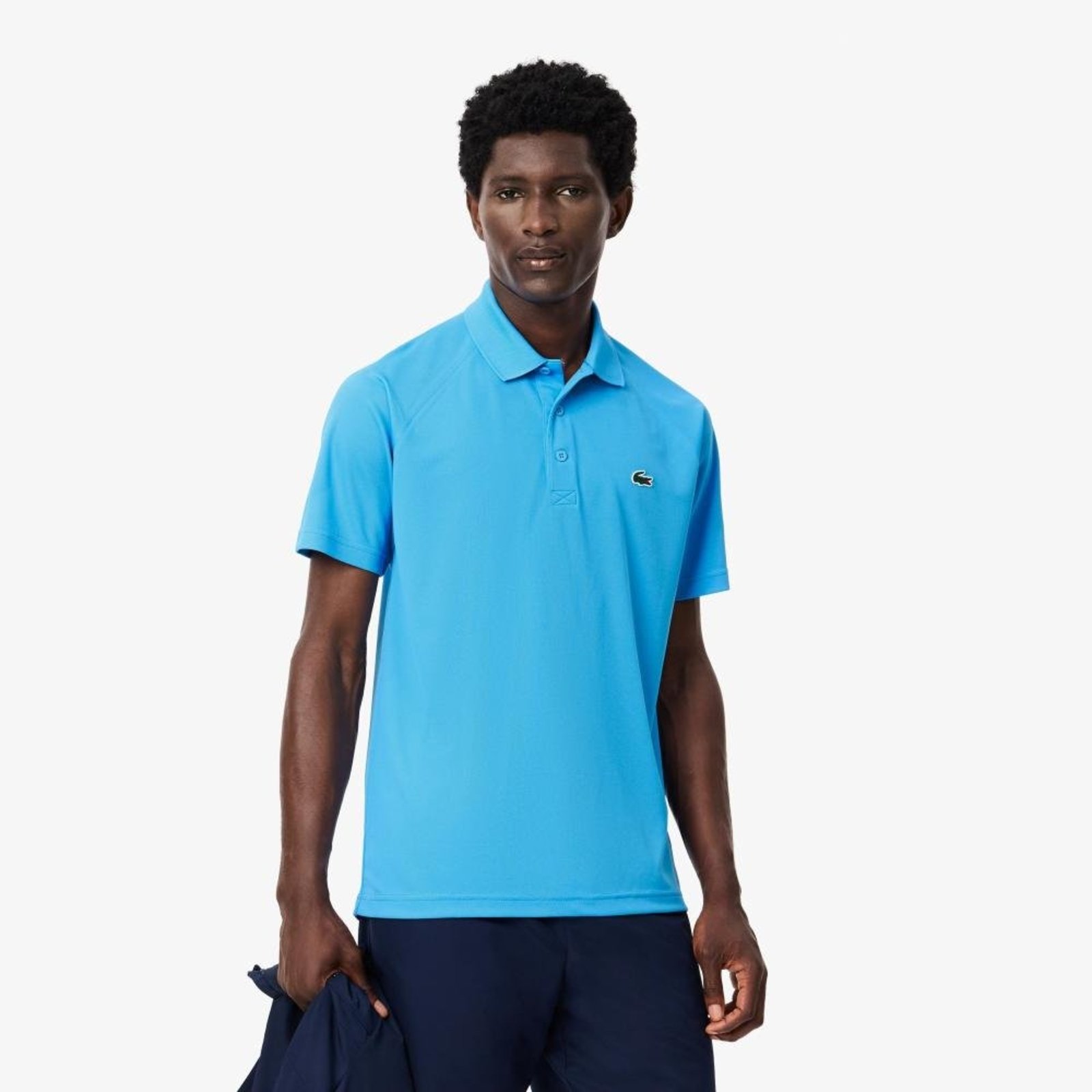 Camisa polo Lacoste monocromática resistente a rasgo respirável Azul