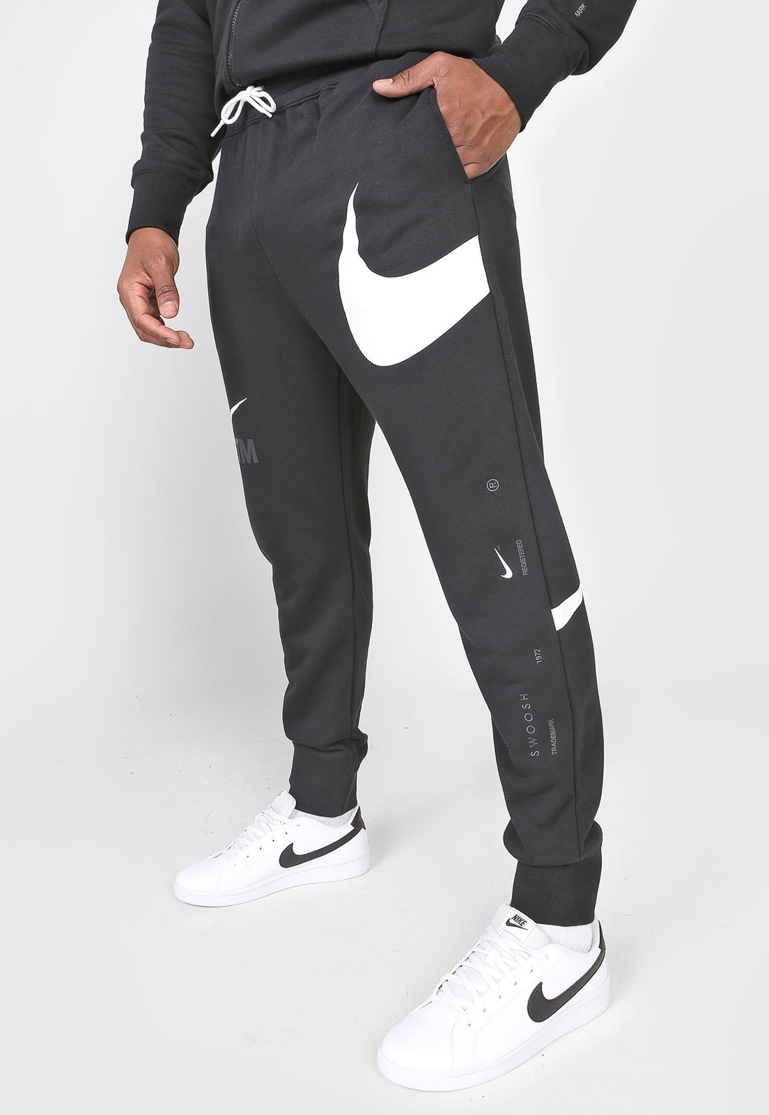 Nike rally black swoosh shop logo slim fit joggers